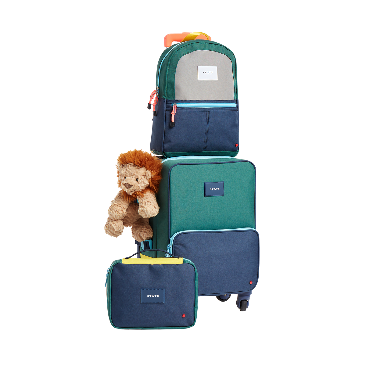 Product image of STATE Bags travel set in green/navy including, mini Logan suitcase, bensen toiletry bag, and Kane Kids mini Travel backpack 