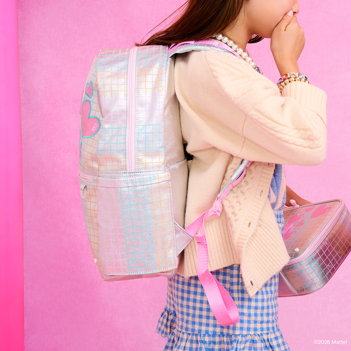 Girl wearing Kane Backpack Barbie Multi Grid Hearts