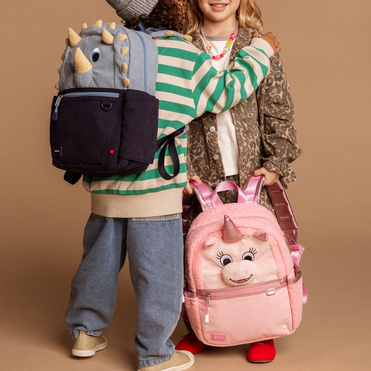 Kids hugging, girl holding kane mini Backpack Unicorn