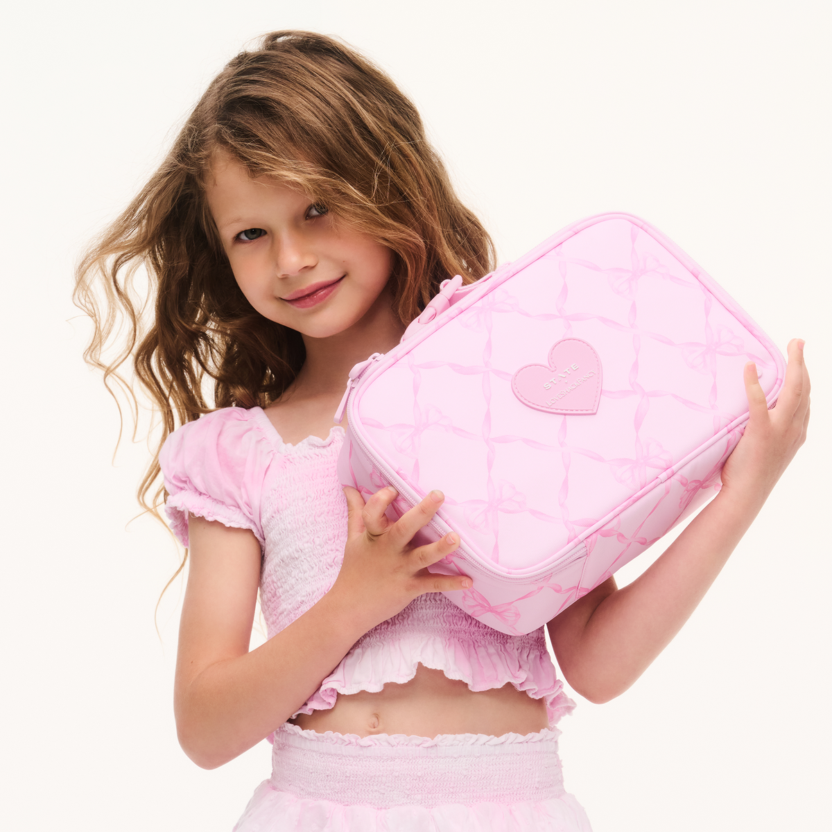 girl holding STATE x LoveShackFancy Rodgers Lunch Box