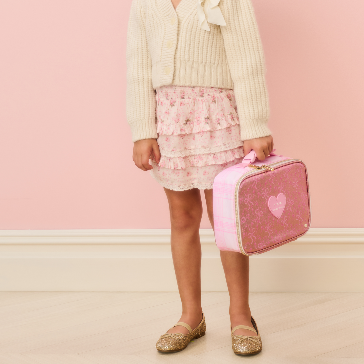 girl holding STATE x LoveShackFancy Rodgers Lunch Box pink vanilla